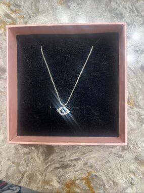 Nique Silver Necklace with Blue and White Evil Eye Pendant